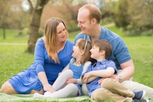 Blackburn Maternity Photography - Photo of a family sitting together laughing